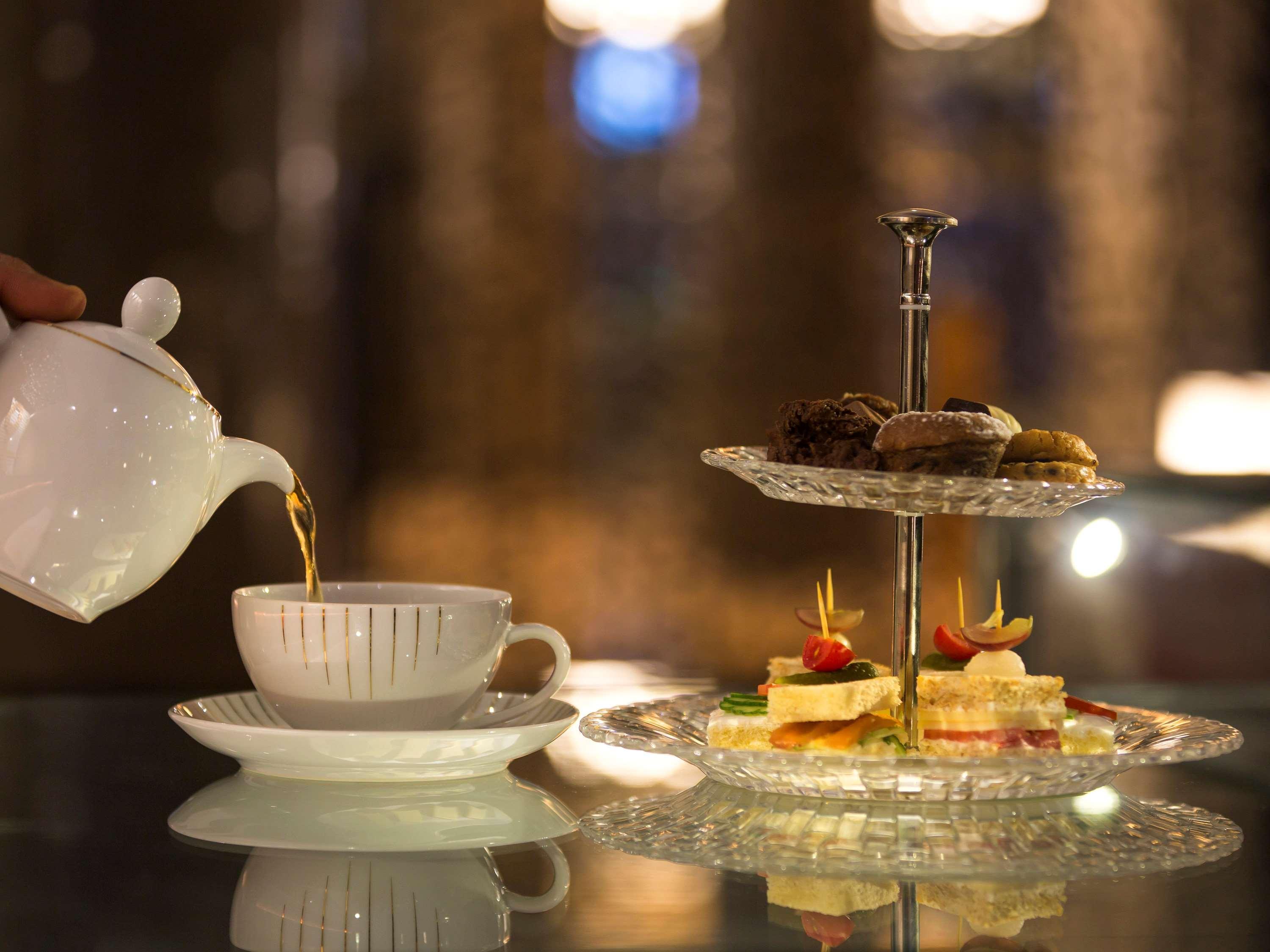 Moevenpick Hotel Du Lac Tunisi Esterno foto Afternoon tea